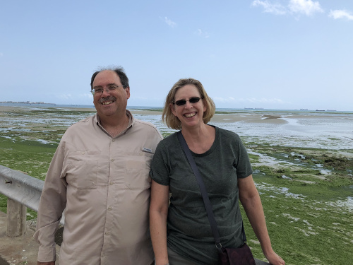 Standing on the shore of the Indian Ocean.