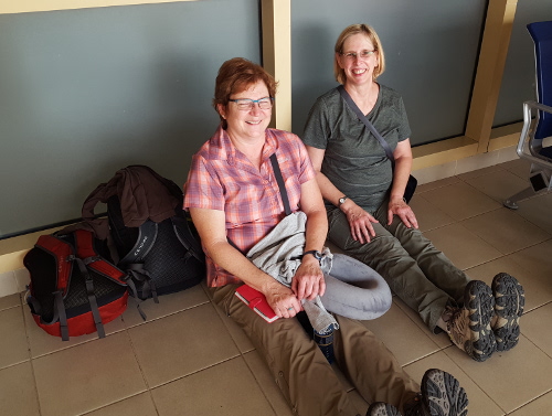 Sitting on the floor at the Nairobi airport.