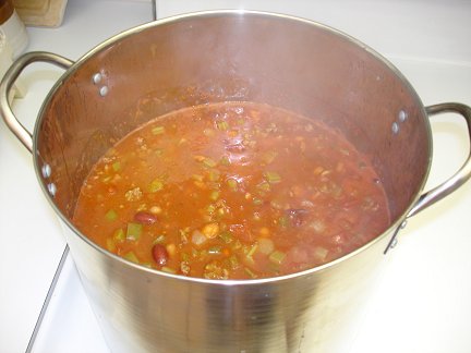 The chili cooking in the stock pot.