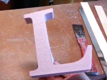 Casting a letter L using lost foam casting.