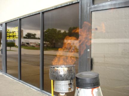 My home-made wood gasifier flaring gas.