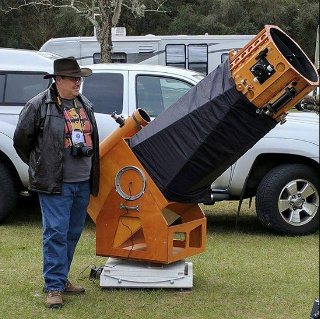 Me and my 17.5 inch Dobsonian telescope