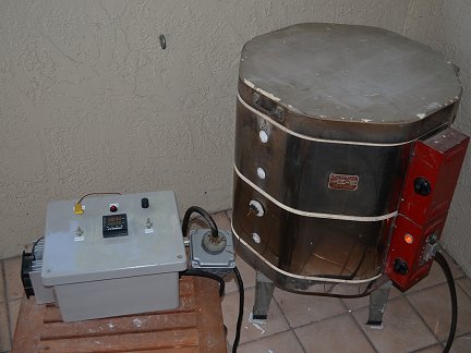 The kiln controller and kiln in operation, fusing glass.