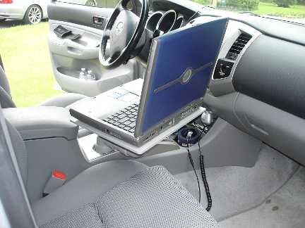 A passenger side view of the laptop tray