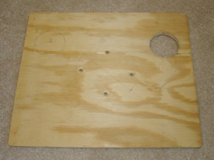 A piece of plywood cut to be the tray