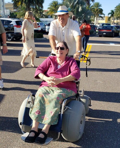 A balloon tire beach wheelchair.