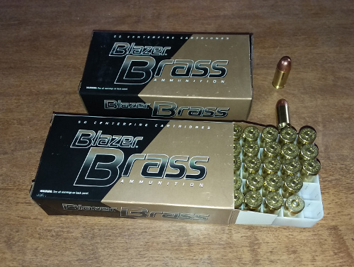 Two boxes of Blazer Brass 45 ACP ammunition.