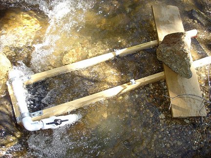 My home-built sluice in a stream in Colorado