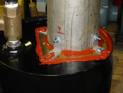 The flange mounted on top of the drum.