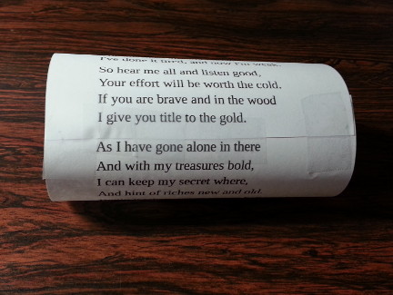 The poem rolled up and the ends joined.