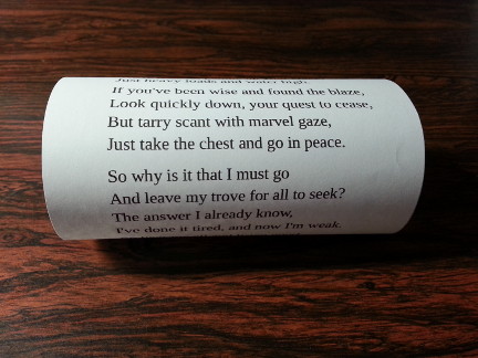 Another view of the rolled up poem.